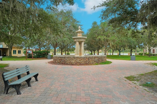 view of home's community featuring a lawn