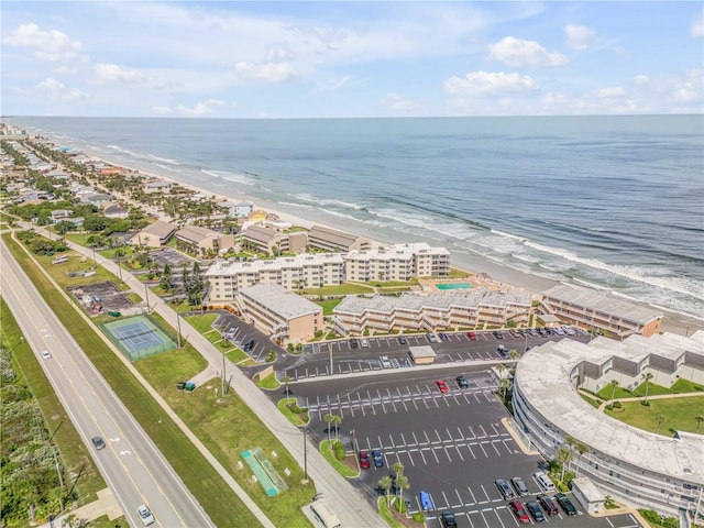 aerial view with a beach view and a water view