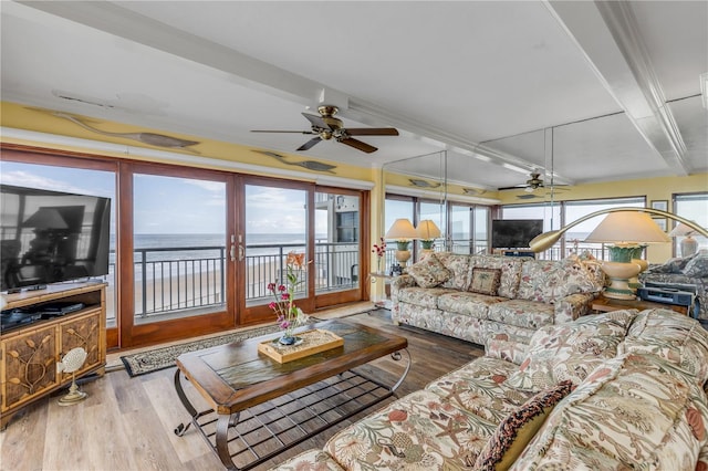 4811 Saxon Dr Unit C102, New Smyrna Beach, FL 32169 - living room featuring ceiling fan, beam ceiling, coffered ceiling, and wood finished floors