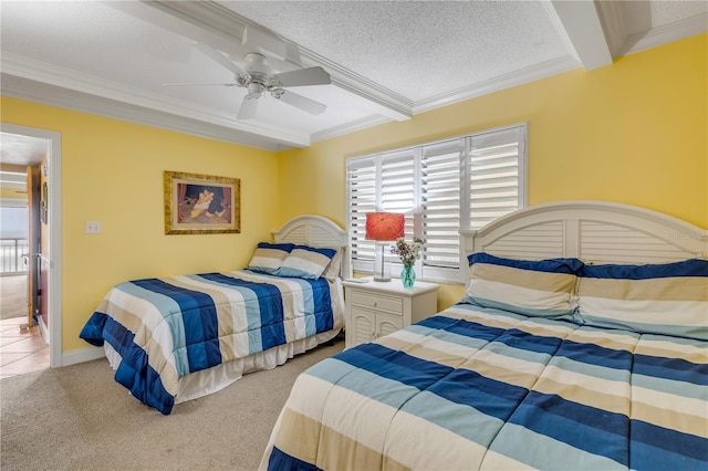 4811 Saxon Dr Unit C102, New Smyrna Beach, FL 32169 - bedroom featuring crown molding, carpet flooring, a textured ceiling, and ceiling fan