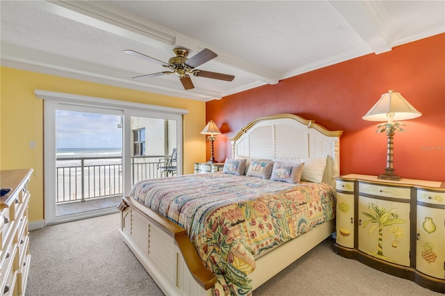 4811 Saxon Dr Unit C102, New Smyrna Beach, FL 32169 - bedroom with crown molding, access to outside, carpet flooring, and beam ceiling