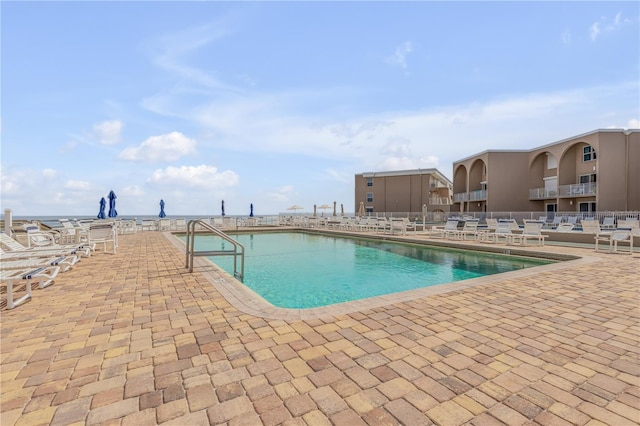 4811 Saxon Dr Unit C102, New Smyrna Beach, FL 32169 - community pool with a patio
