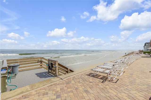 4811 Saxon Dr Unit C102, New Smyrna Beach, FL 32169 - exterior space featuring a water view and a view of the beach