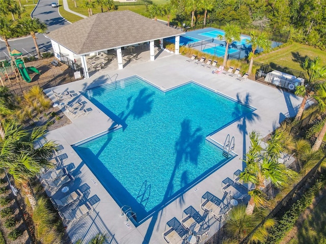 view of swimming pool featuring a patio