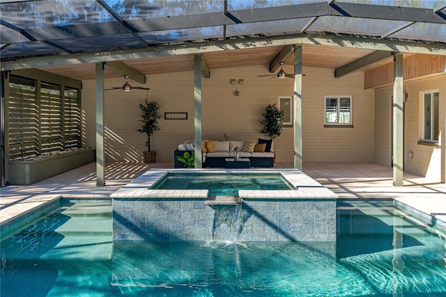 view of swimming pool featuring outdoor lounge area, a lanai, and a patio