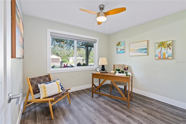 home office featuring hardwood / wood-style floors and ceiling fan