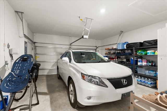 garage featuring a garage door opener