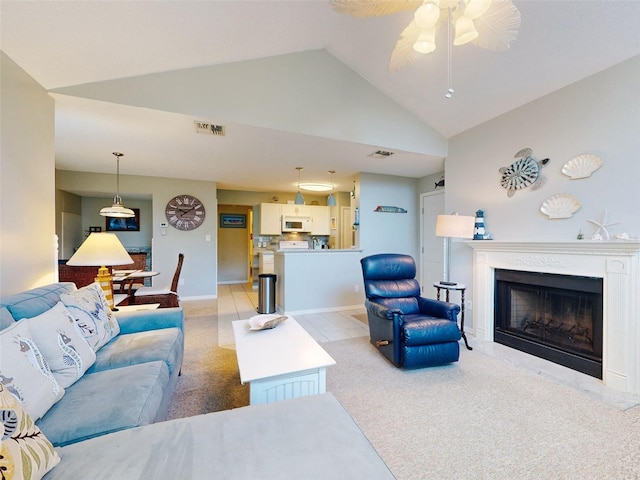 living room with baseboards, a fireplace, visible vents, and light colored carpet