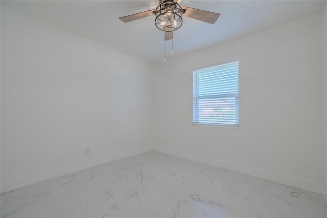 unfurnished room with ceiling fan