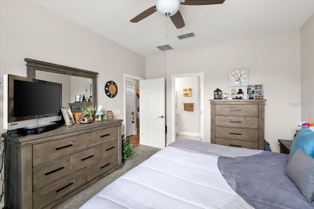 bedroom featuring connected bathroom, ceiling fan, and carpet