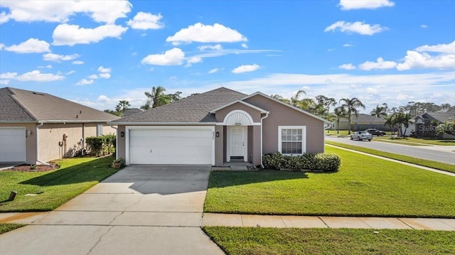 ranch-style home featuring a front yard and a garage