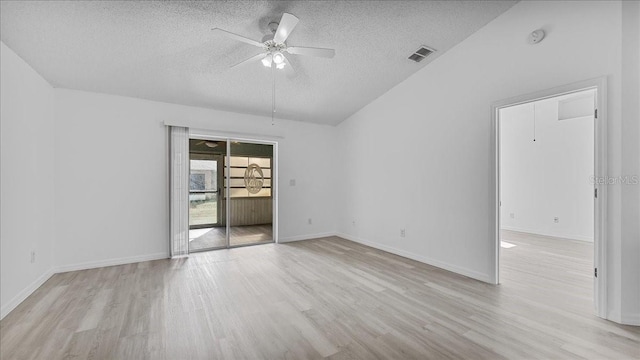 unfurnished room with ceiling fan, light hardwood / wood-style floors, and a textured ceiling