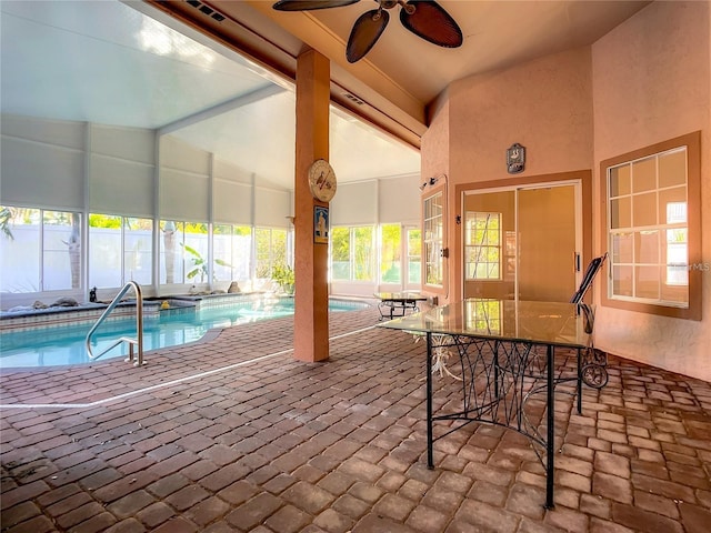 view of pool featuring ceiling fan and a patio