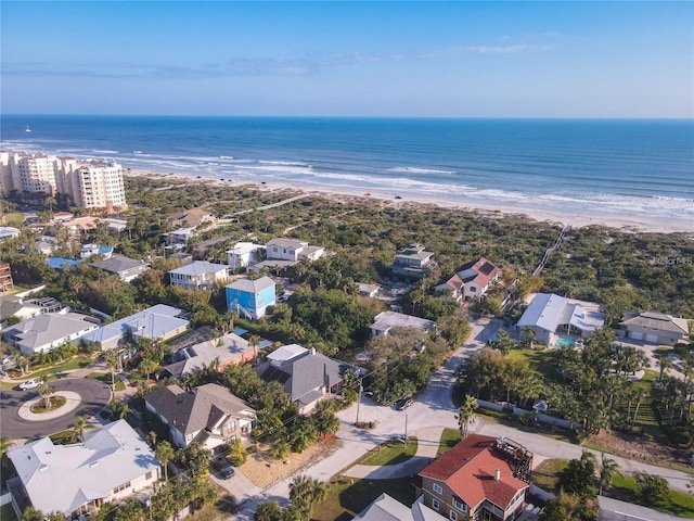 aerial view featuring a water view and a beach view