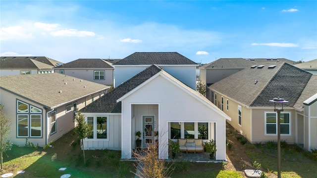 back of property featuring a patio