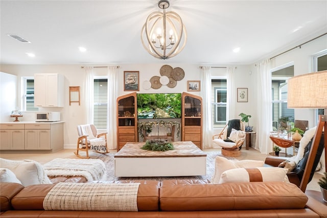 living room featuring an inviting chandelier