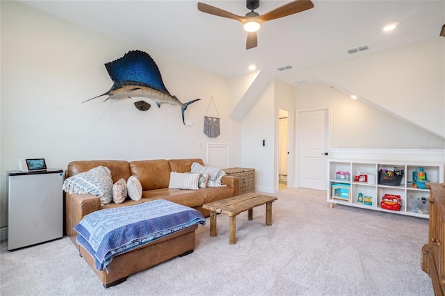 living room with ceiling fan and light carpet