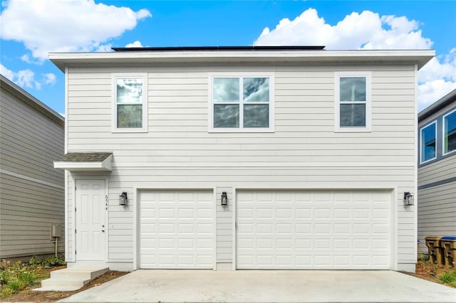 exterior space with a garage