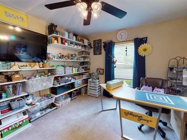 office area with ceiling fan and carpet floors