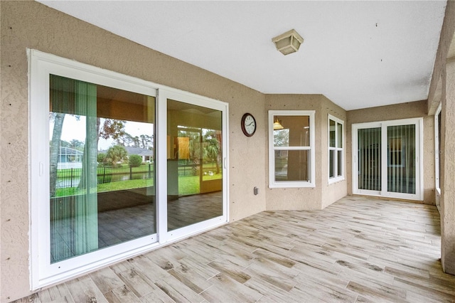 view of unfurnished sunroom