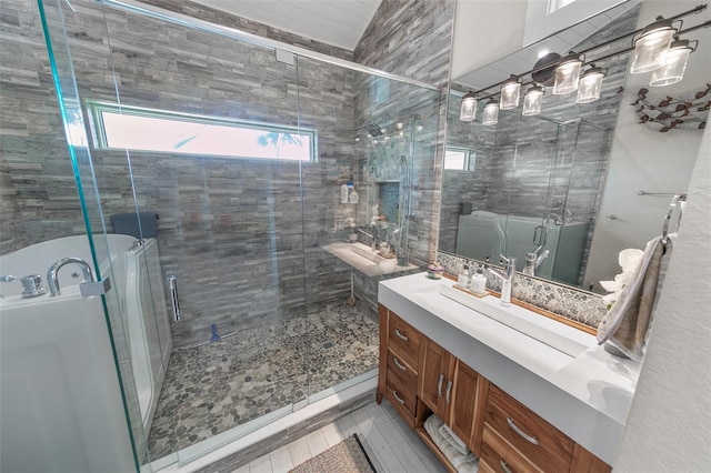 bathroom featuring tile patterned floors, vanity, and an enclosed shower