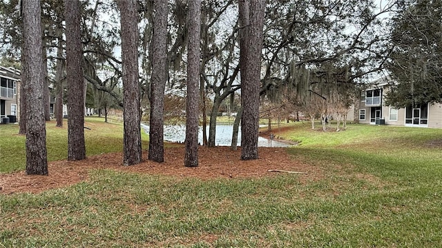 view of yard with a water view