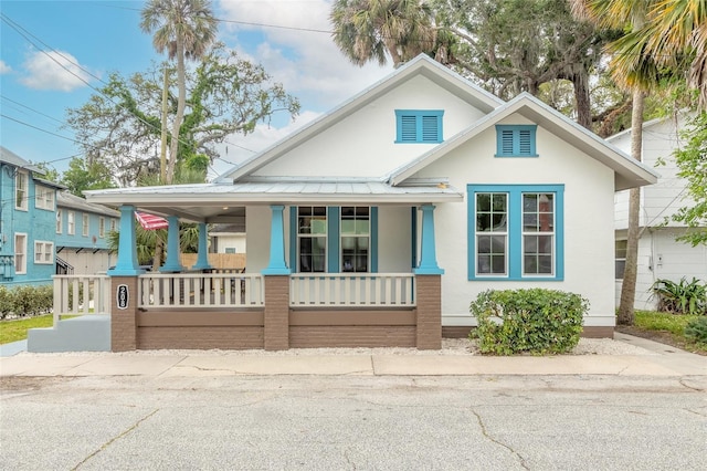 view of front of home featuring covered porch