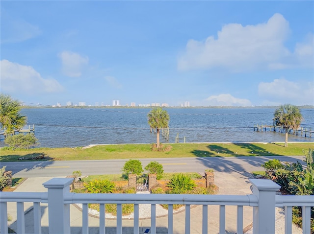 water view with a fenced front yard