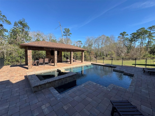 view of pool featuring a gazebo, a patio, and an in ground hot tub