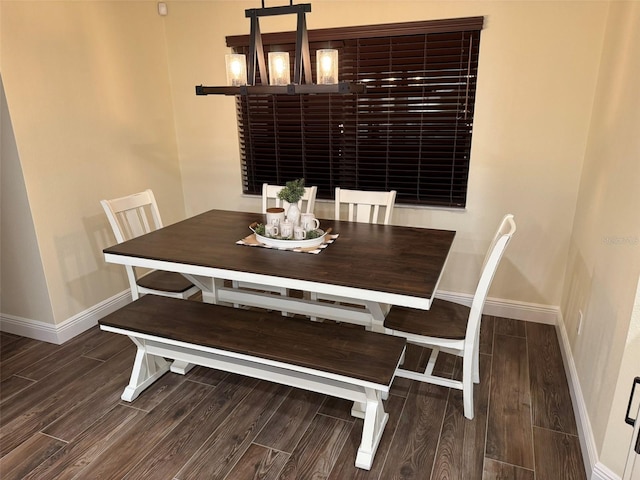 dining room featuring dark hardwood / wood-style flooring