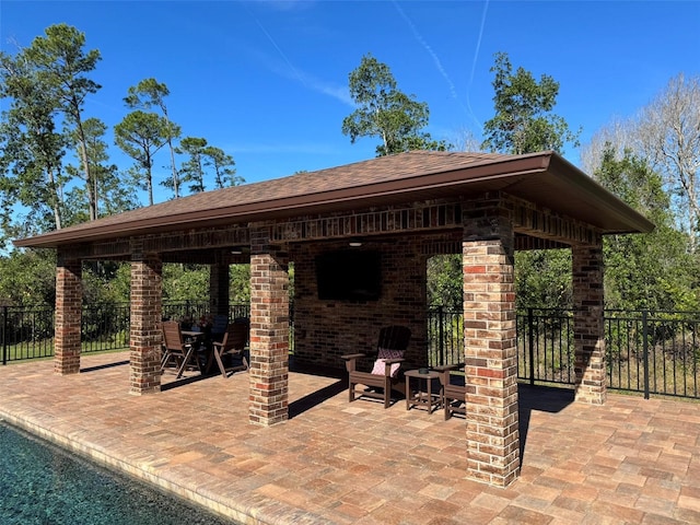 view of patio with fence