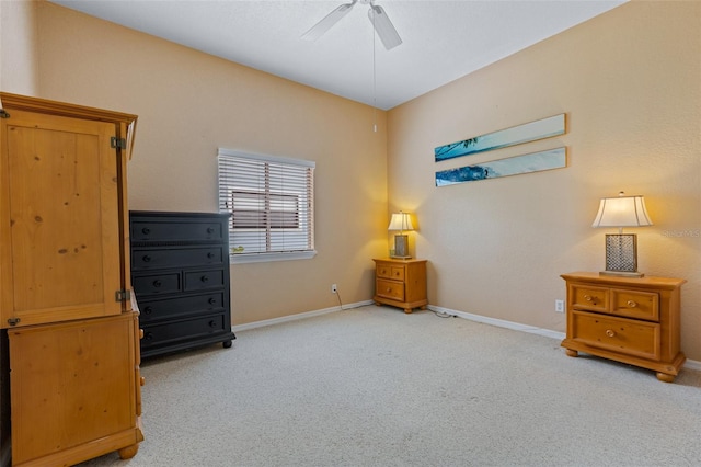 bedroom featuring ceiling fan and light carpet