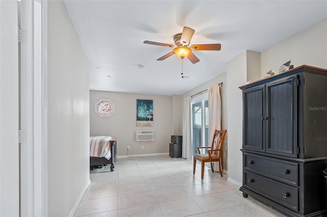 living area featuring ceiling fan, light tile patterned flooring, and a wall mounted air conditioner