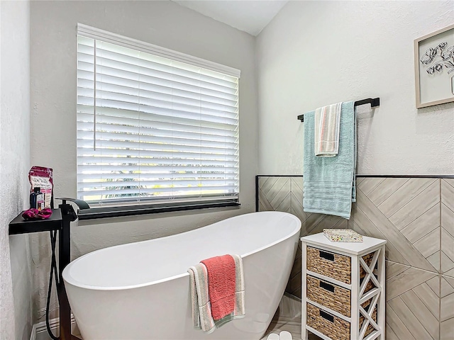 bathroom with a bathing tub