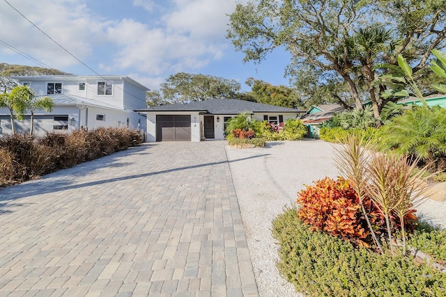 view of front of property with a garage