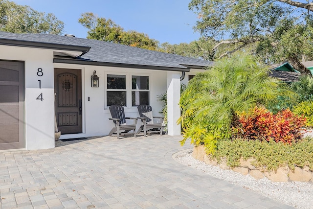 doorway to property featuring a patio