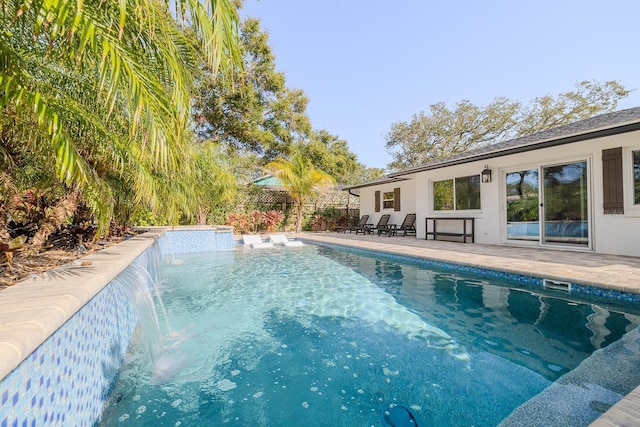 view of pool featuring pool water feature