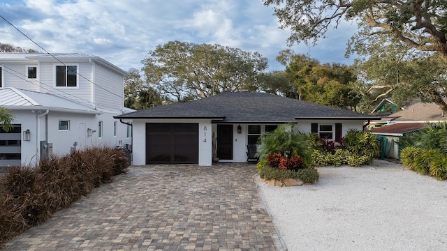 view of front of property featuring a garage