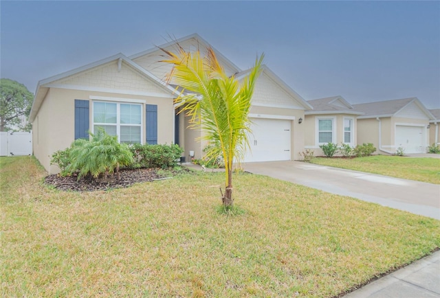 ranch-style home featuring a front lawn and a garage