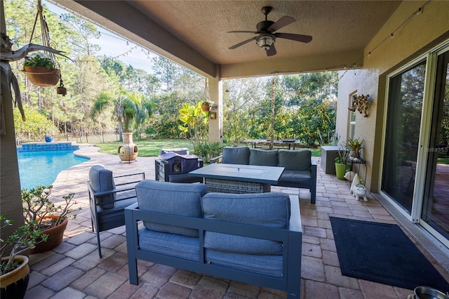 view of patio featuring ceiling fan and an outdoor hangout area