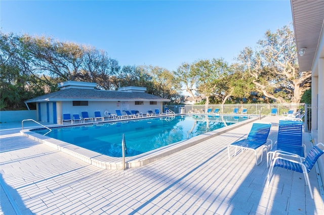 view of swimming pool with a patio area