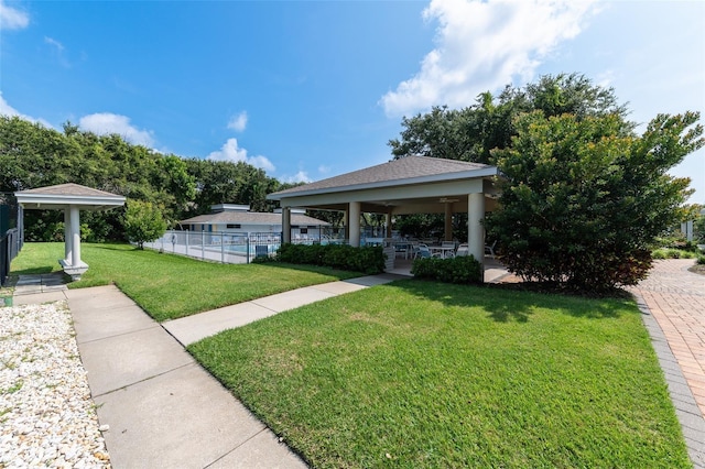 view of home's community featuring a gazebo and a yard