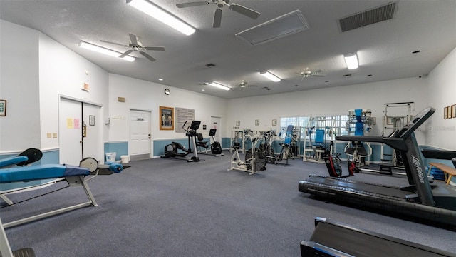 workout area with a textured ceiling