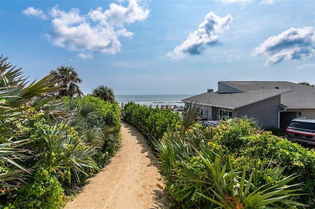 exterior space with a water view