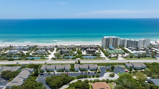 bird's eye view with a view of the beach and a water view