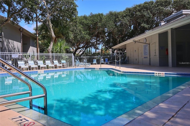 view of swimming pool with a patio