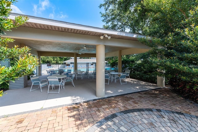 view of patio / terrace featuring ceiling fan