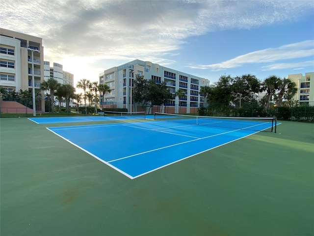 view of tennis court featuring basketball court