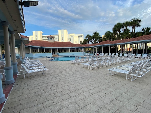 view of swimming pool with a patio area