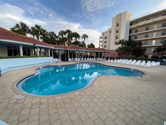 view of swimming pool featuring a patio